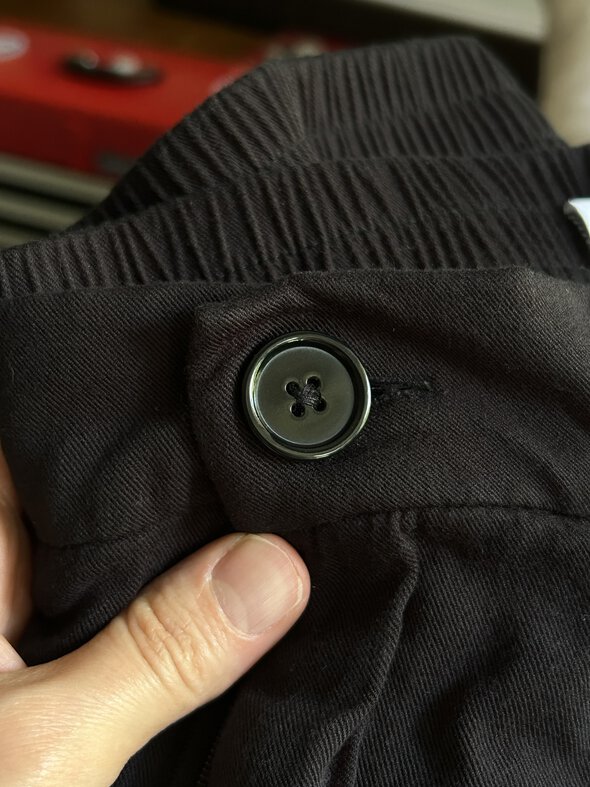 mended button.