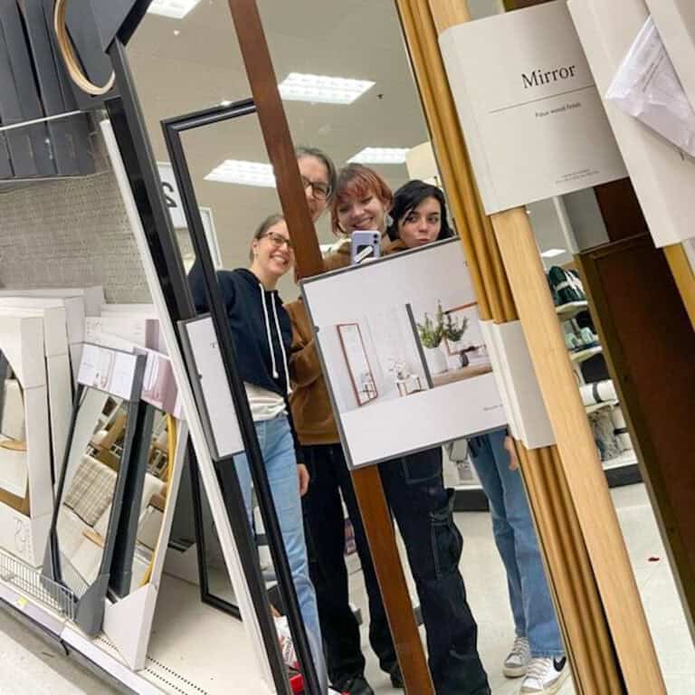 Kristen and kids in mirrors.