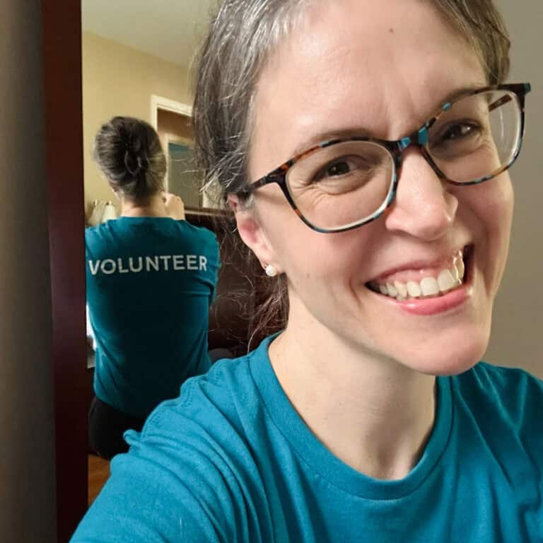 Kristen in a volunteer shirt.