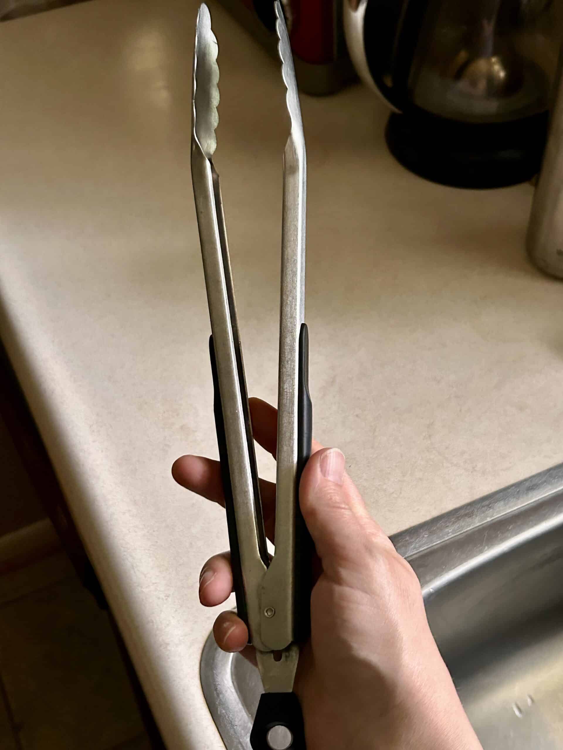long tongs.