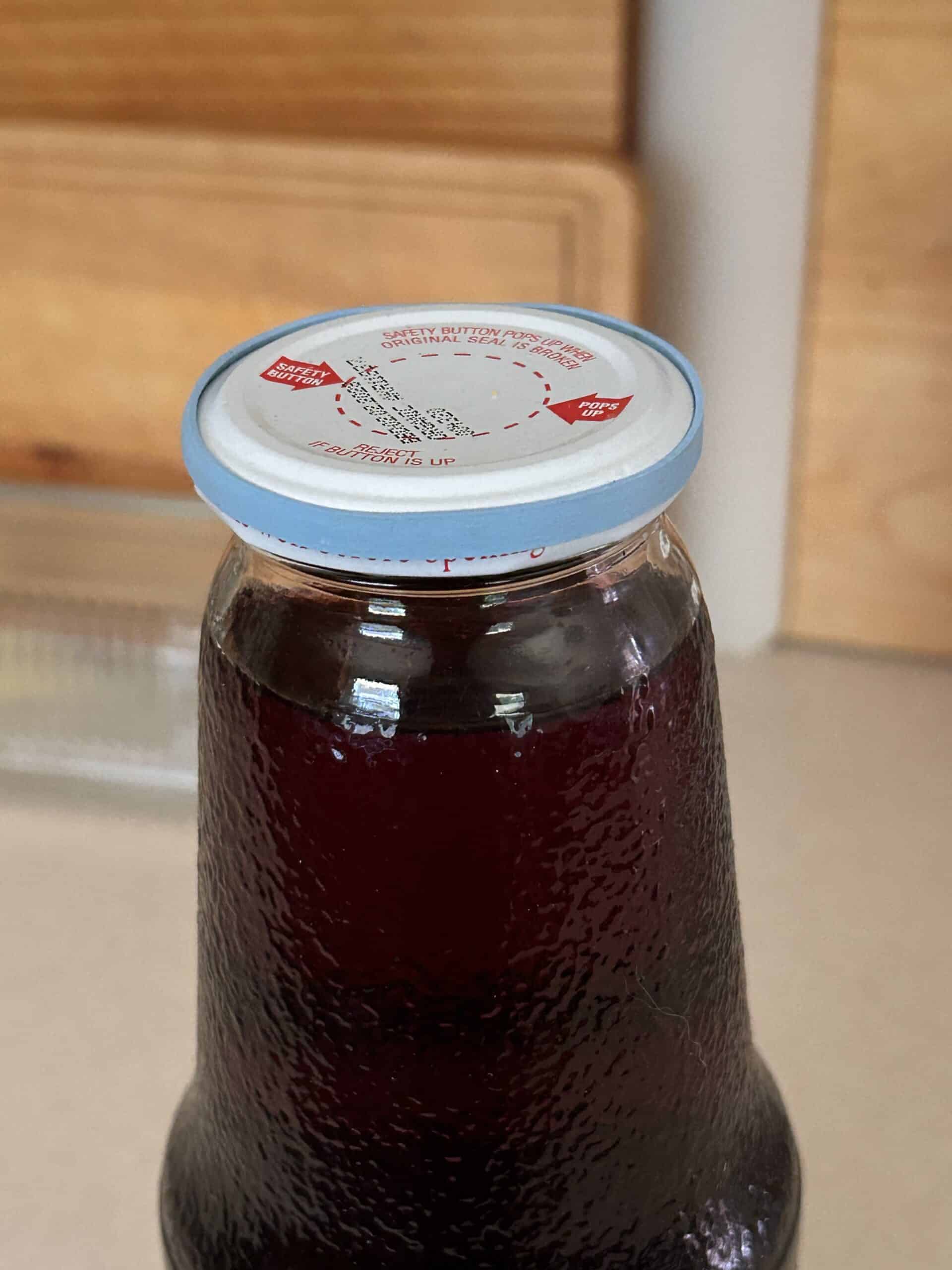 rubber band around jar lid.
